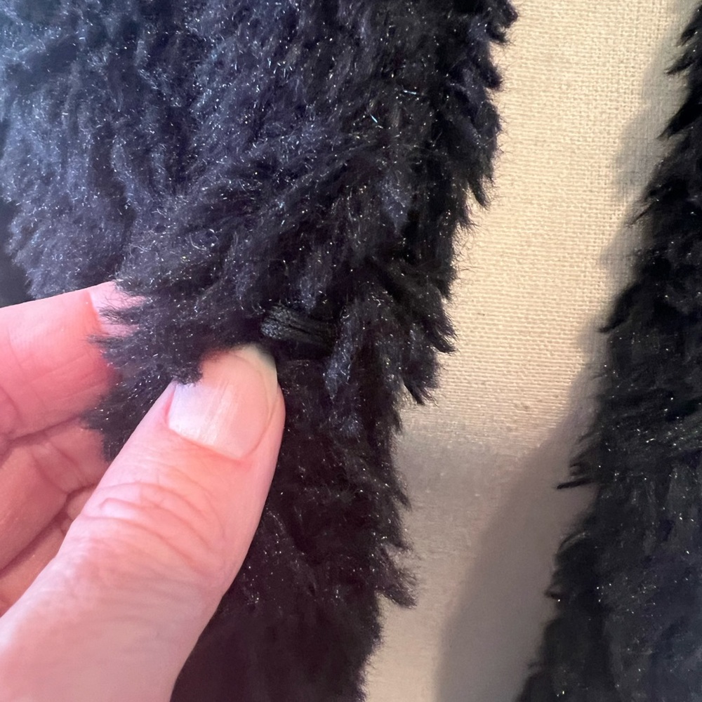 H&M fuzzy little jacket. Light, but fluffy. Slight shimmer in the fabric. - Picture 2 of 4